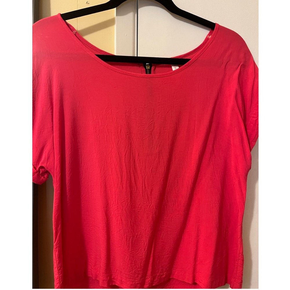 Bright pink, silky dressy t-shirt with zipper back.